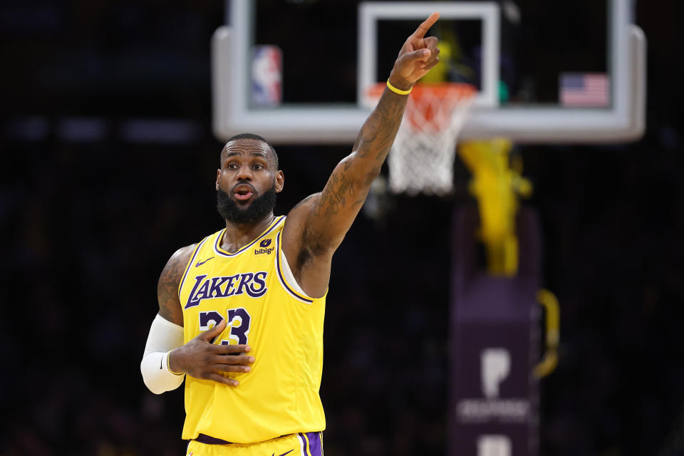 LOS ANGELES, CALIFORNIA - DECEMBER 28:  LeBron James #23 of the Los Angeles Lakers calls to teammates during the second half of a game against the Charlotte Hornets at Crypto.com Arena on December 28, 2023 in Los Angeles, California. NOTE TO USER: User expressly acknowledges and agrees that, by downloading and or using this photograph, User is consenting to the terms and conditions of the Getty Images License Agreement.  (Photo by Sean M. Haffey/Getty Images)