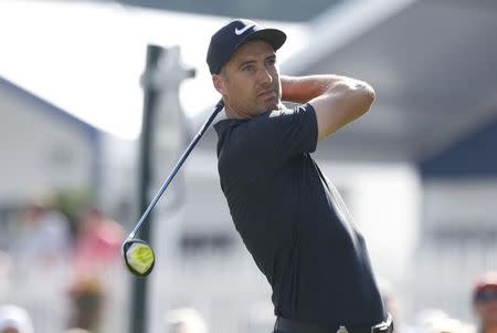 Jul 29, 2016; Springfield, NJ, USA; PGA golfer Ross Fisher tees off on the 18th hole during the second round of the 2016 PGA Championship golf tournament at Baltusrol GC - Lower Course. Mandatory Credit: Brian Spurlock-USA TODAY Sports