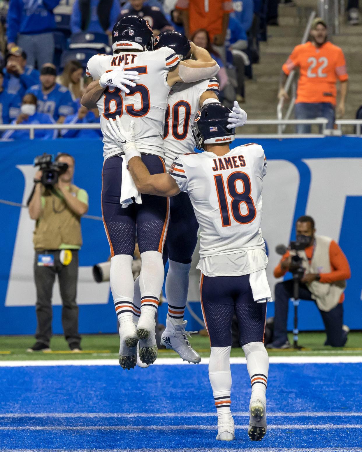 Nov 25, 2021; Detroit, Michigan, USA; Chicago Bears tight end Jimmy Graham (80) celebrates a touchdown with tight end Cole Kmet (85) and wide receiver Jon'Vea Johnson (18) in the second quarter against the Detroit Lions at Ford Field. Mandatory Credit: David Reginek-USA TODAY Sports