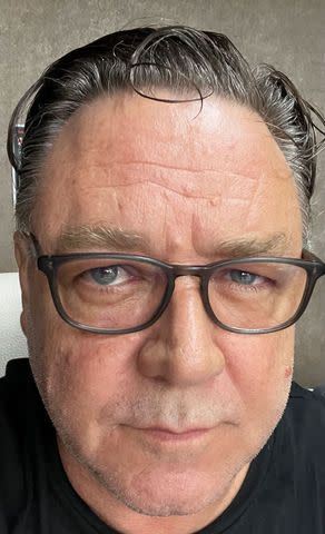 <p>Russell Crowe/X</p> Russell Crowe shares selfie of his freshly shaved face on X.
