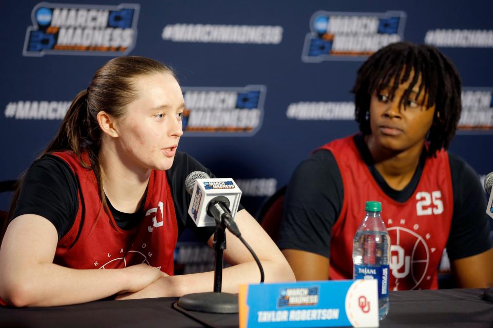 Oklahoma's Taylor Robertson, left, and Madi Williams answer questions during a press conference for the University for the Oklahoma women's basketball team prior to the first round of the NCAA Tournament at Lloyd Noble Center in Norman, Okla., Friday, March 18, 2022. Oklahoma will play IUPUI in the first round of the tournament on Saturday, March 19.