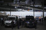 FILE - French police patrol the Old Port of Marseille in southern France, May 6, 2024. French authorities are preparing to host a 1,000-boat armada accompanying the Olympic flame on its arrival into the Mediterranean port of Marseille. The Olympic torch finally enters France when it reaches the southern seaport of Marseille on Wednesday May 8, 2024, on an armada from Greece. After leaving Marseille a vast relay route will be undertaken before the torch's odyssey ends on July 27 in Paris. (AP Photo/Daniel Cole, File)