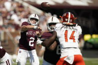 Mississippi State quarterback Will Rogers (2) passes under pressure from Bowling Green linebacker Demetrius Hardamon (14) during the first half of an NCAA college football game in Starkville, Miss., Saturday, Sept. 24, 2022. (AP Photo/Rogelio V. Solis)