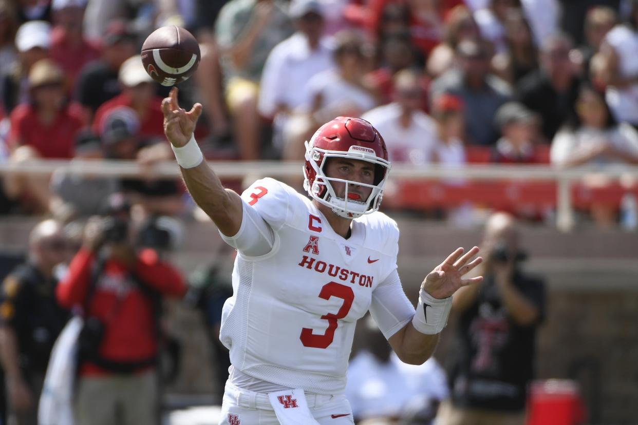 Houston quarterback Clayton Tune (3) throughs pass attempt against Texas Tech during the first half of an NCAA college football game Saturday, Sept. 10, 2022, in Lubbock, Texas. (AP Photo/Justin Rex)