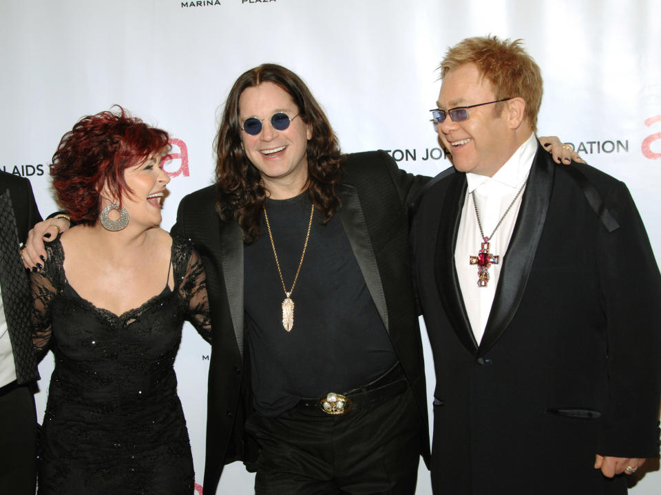 From left, Sharon Osbourne, Ozzy Osbourne and singer Elton John arrive at the Elton John AIDS Foundation's sixth annual benefit "An Enduring Vision" at The Waldorf-Astoria Hotel, Tuesday, Sept. 25, 2007 in New York.  (AP Photo/Evan Agostini)