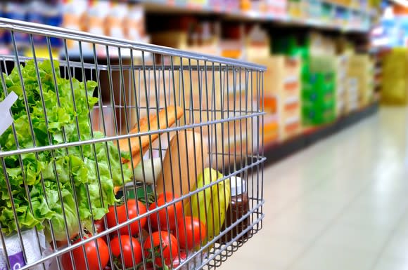 A shopping cart in a grocery store.