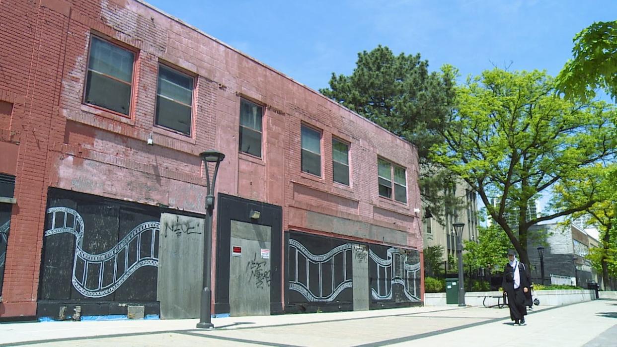 Windsor developer Rhys Trenhaile is working to convert two downtown buildings, including this one, into residential units with retail space.  (Chris Ensing/CBC - image credit)