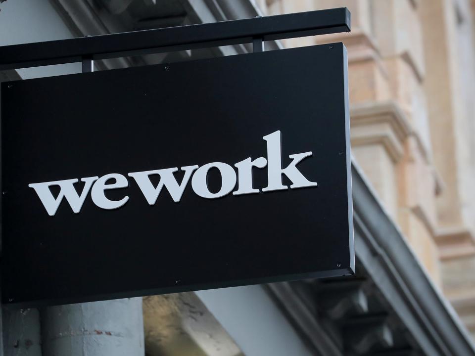 FILE PHOTO: The WeWork logo is displayed outside a co-working space in New York City, New York U.S., January 8, 2019. REUTERS/Brendan McDermid/File Photo