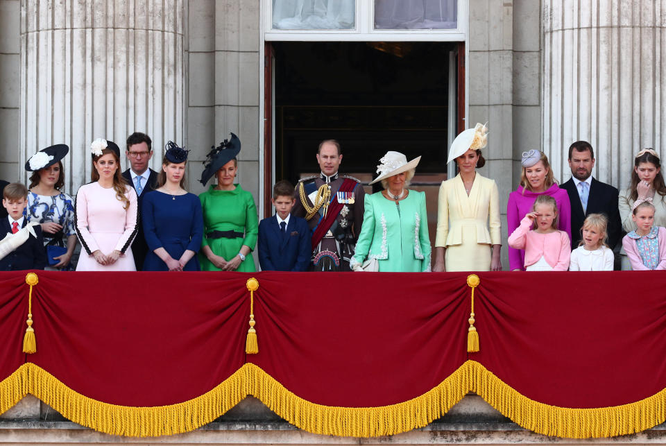 Members of the royal family wave from the balcony of Buckingham Palace at the conclusion of the Trooping the Colour ceremony.