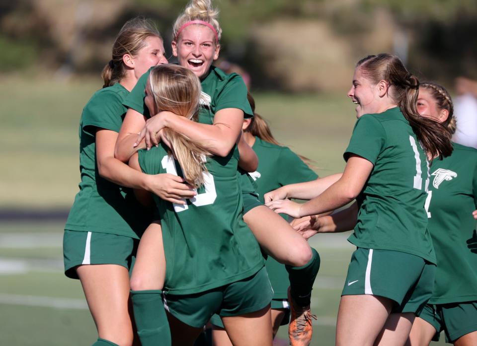 Clearfield celebrates a goal made by Tatum Thomas, center, during a girls varsity soccer game against Box Elder at Clearfield High School in Clearfield on Thursday, Sept. 14, 2023. Clearfield won 2-1. | Kristin Murphy, Deseret News