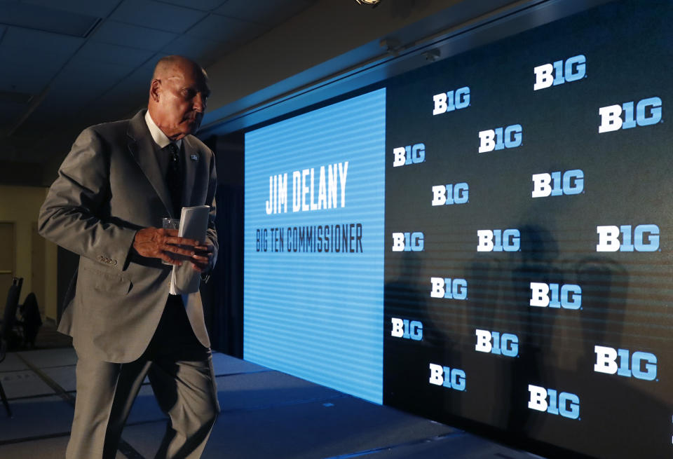 Big Ten Commissioner Jim Delany walks away from the podium at the Big Ten Conference NCAA college football media days Thursday, July 18, 2019, in Chicago. Delany will retire on Jan. 1, 2020, with Minnesota Vikings executive Kevin Warren succeeding him. (AP Photo/Charles Rex Arbogast)