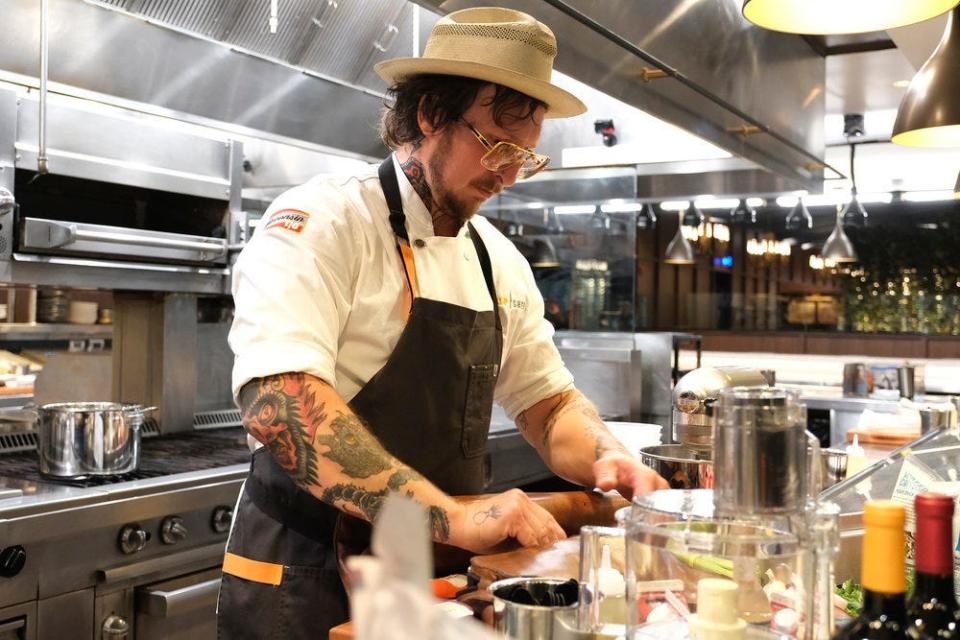 San Francisco chef David Murphy makes a dish from leftover ingredients in the Elimination Challenge last-chance cook-off on "Top Chef: Wisconsin" Episode 1.