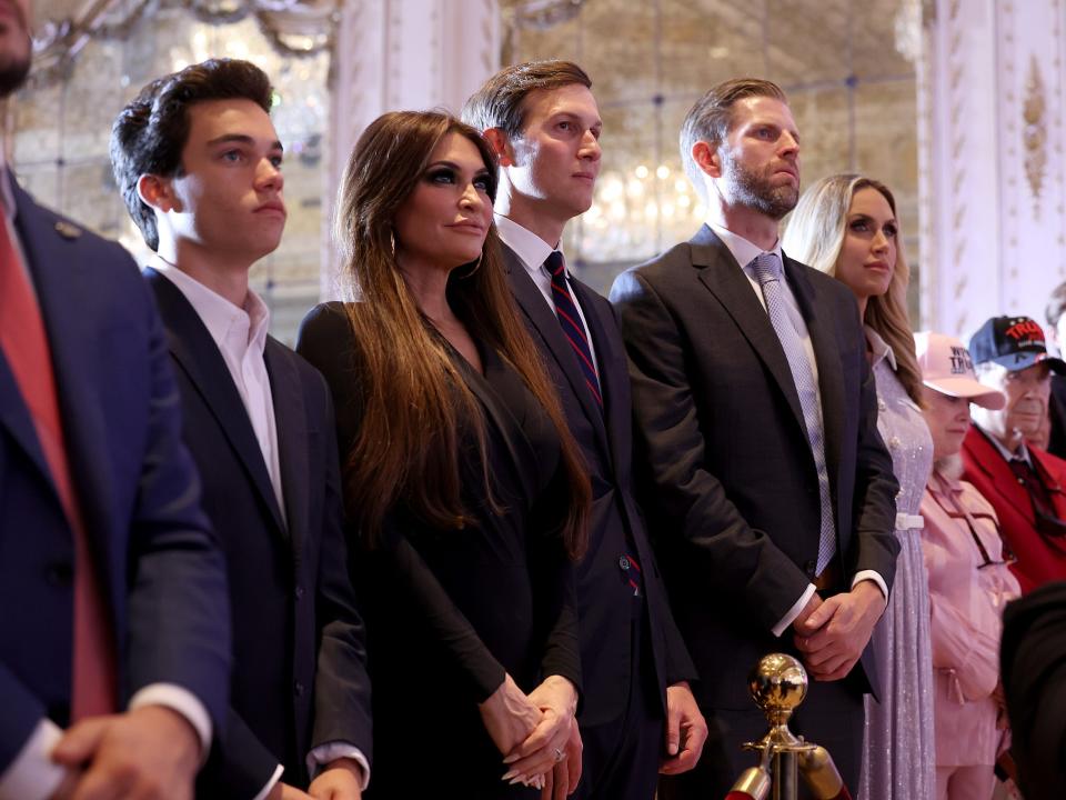 Kimberly Guilfoyle with members of the Trump family in November 2022.
