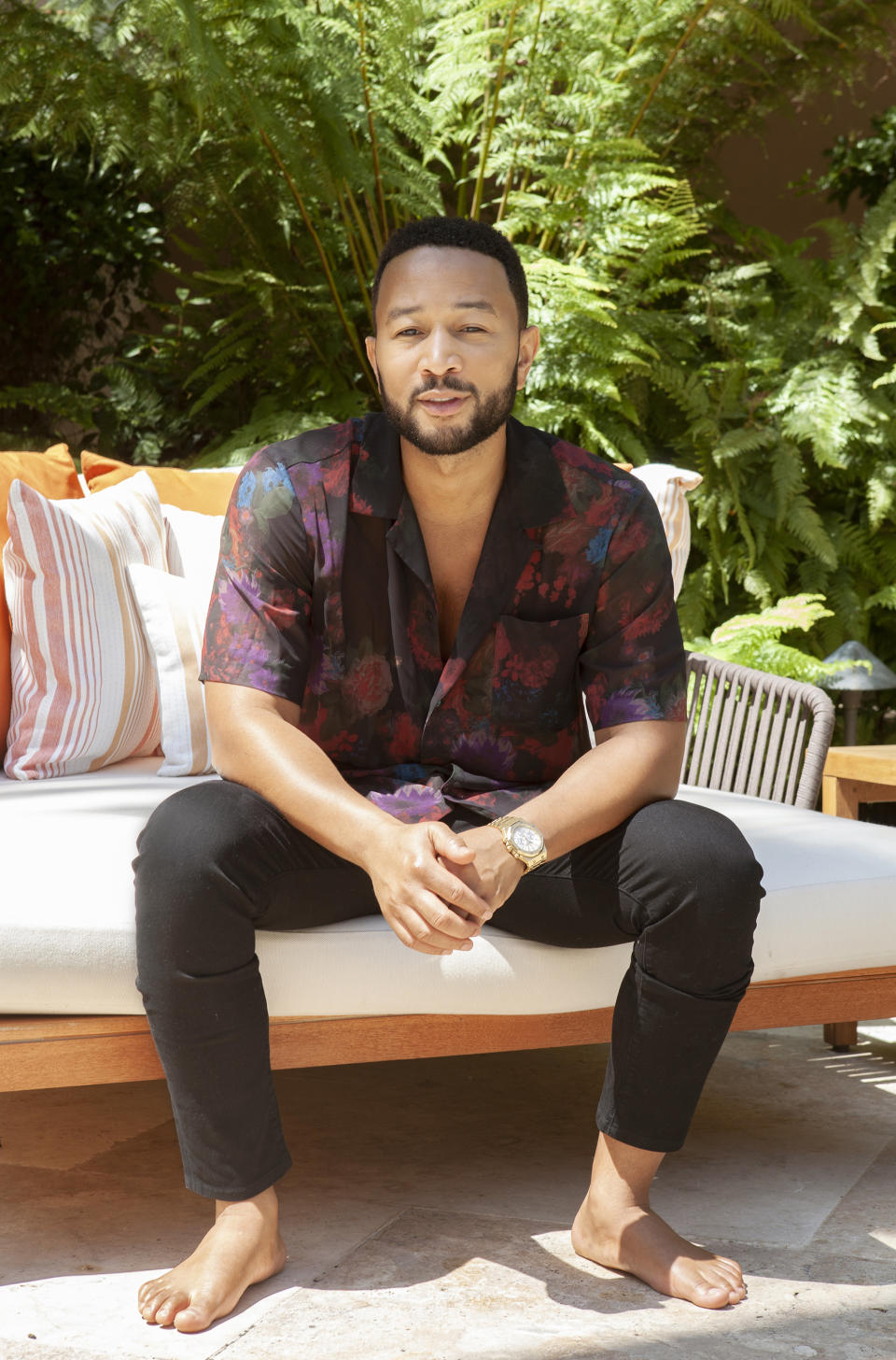 In this June 13, 2020 photo, singer-songwriter John Legend appears during a photo session at The Bel Air Hotel in Beverly Hills, Calif., to promote his latest album "Bigger Love." (Photo by Rebecca Cabage/Invision/AP)