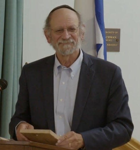 Ken Littman, congregant and board member of Temple Beth El in Fall River, delivers a speech to fellow members of the Beth El community during an event in 2023.
