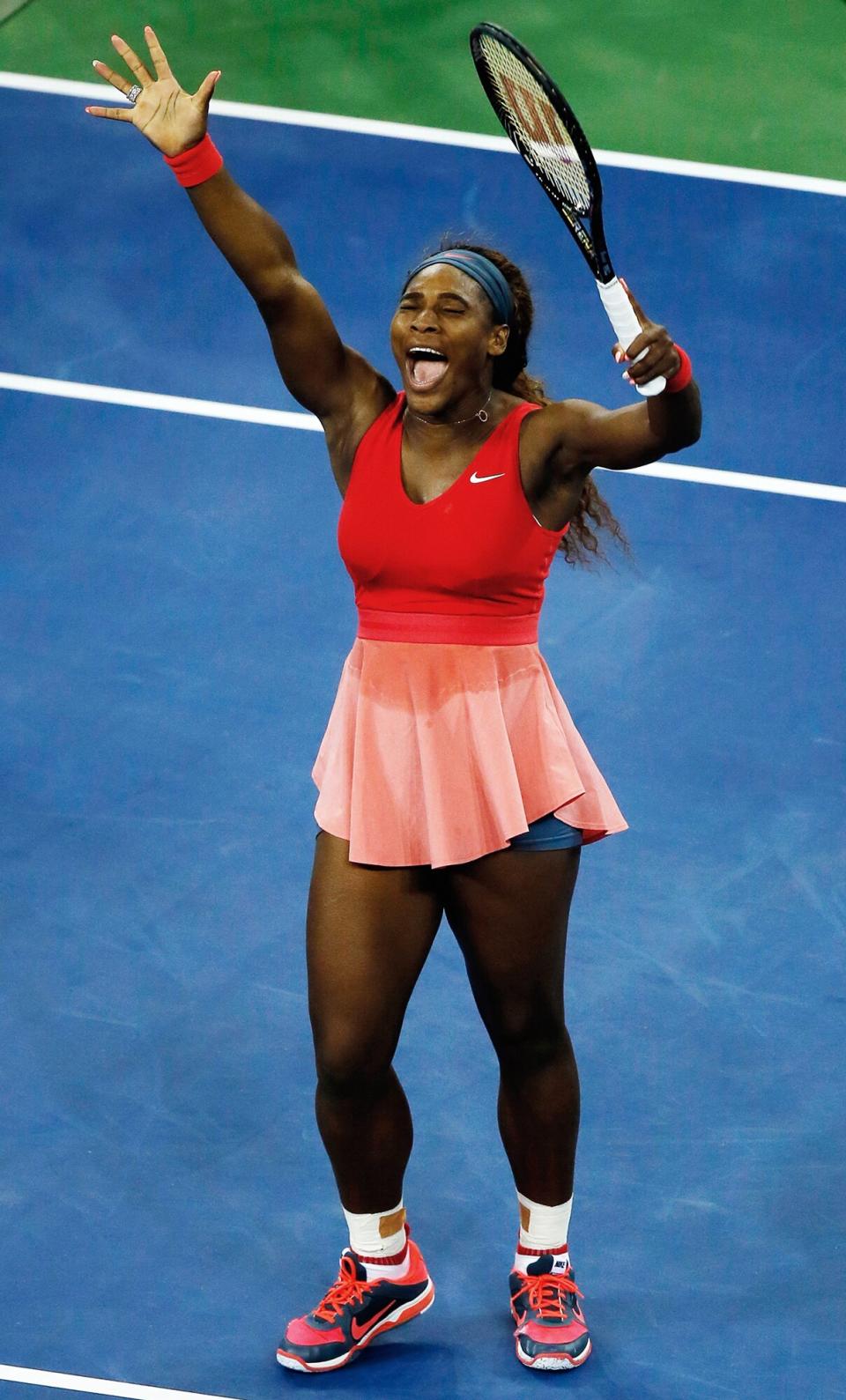 Serena Williams of the United States celebrates winning her women's singles final match against Victoria Azarenka of Belarus on Day Fourteen of the 2013 US Open at the USTA Billie Jean King National Tennis Center on September 8, 2013 in New York City