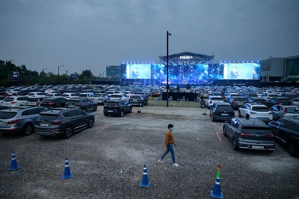 People attend a drive-in concert in a parking lot in Goyang amid social gathering concerns due to the covid-19 novel coronavirus.