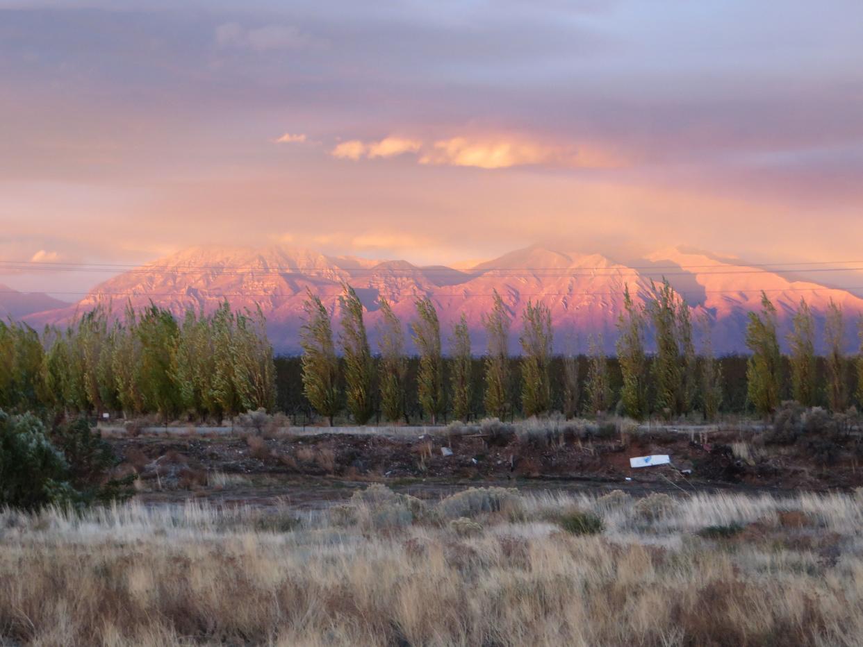 Misty Sunset over Wasatch Mountains, U.S. Route 6, Santaquin, Utah.
