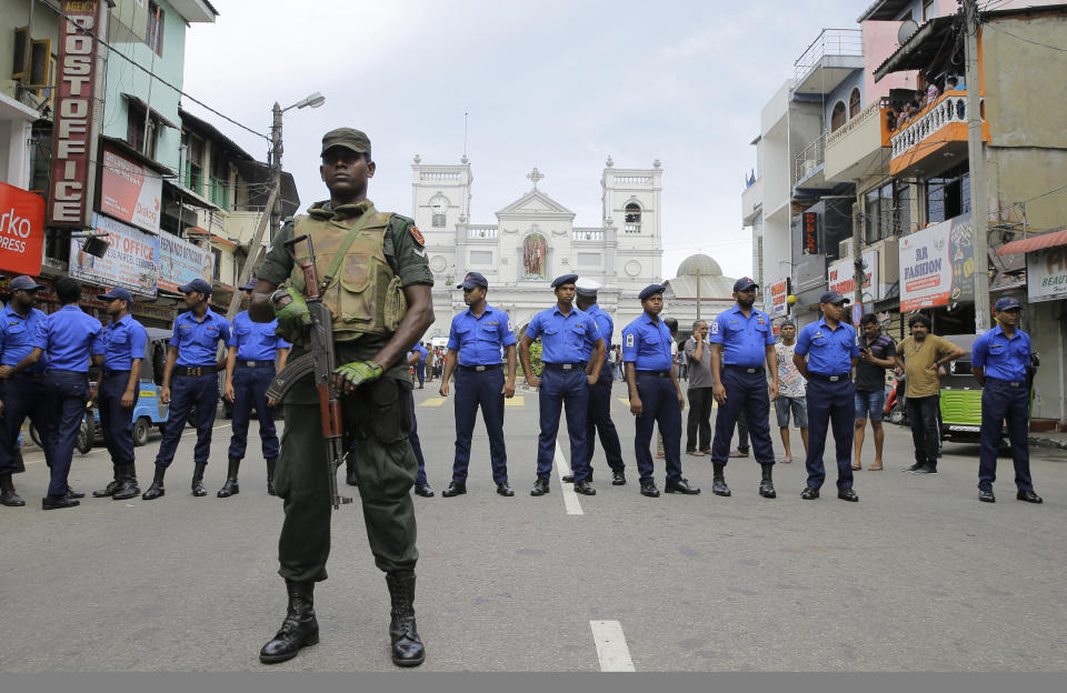 Sri Lankan Army soldiers secure the area around St. Anthony’s Shrine after a blast in Colombo, Sri Lanka, Sunday, April 21, 2019. Witnesses are reporting two explosions have hit two churches in Sri Lanka on Easter Sunday, causing casualties among worshippers. (AP Photo/Eranga Jayawardena)