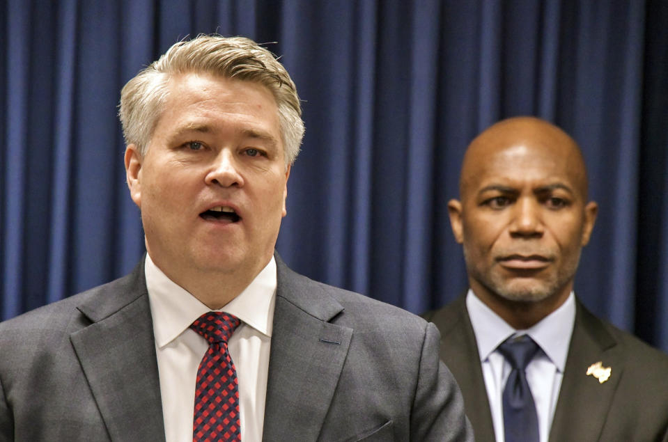 Thomas J. Sobocinski, Special Agent in Charge, FBI Baltimore Field Office, left, speaks during a news conference in Baltimore, Monday, Feb. 6, 2023. Sobocinski and Erek L. Barron, U.S. Attorney for Maryland, right, announced the arrests and a federal criminal complaint charging Sarah Beth Clendaniel, of Catonsville, and Brandon Clint Russell, of Orlando, with conspiracy to destroy an energy facility. (Amy Davis/The Baltimore Sun via AP)