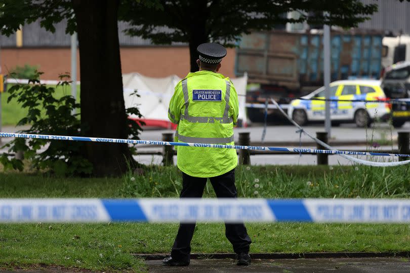 Police at the scene of the fatal collision