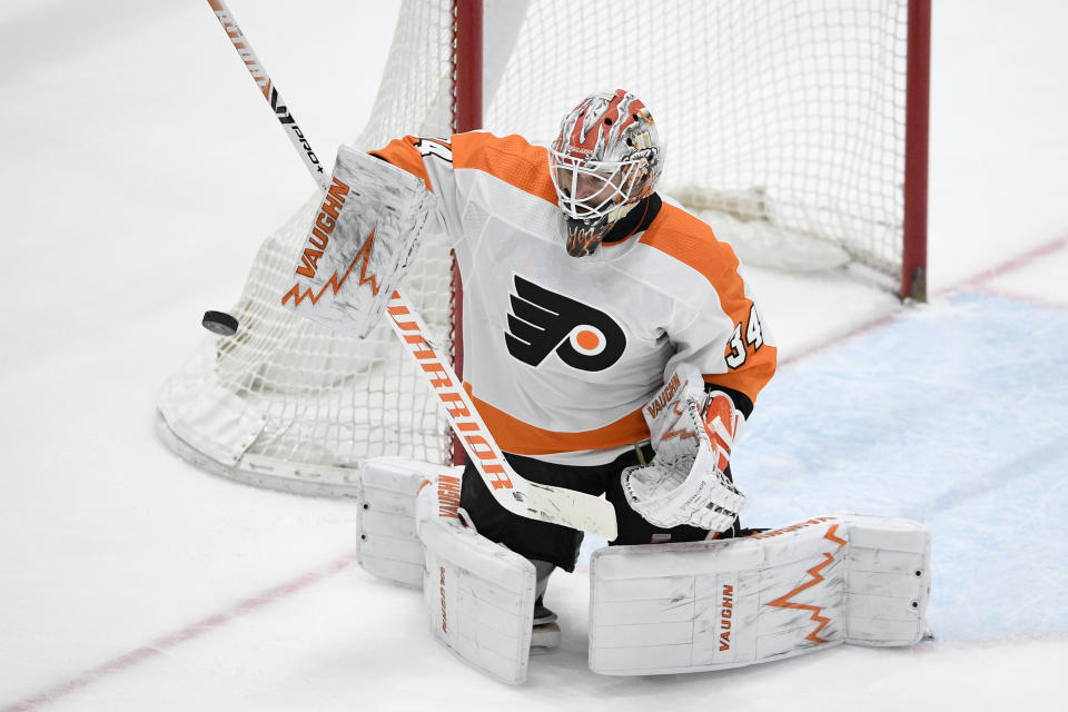 Philadelphia Flyers goaltender Alex Lyon defends the net during the third period of the team's NHL hockey game against the Washington Capitals, Saturday, May 8, 2021, in Washington. The Capitals won 2-1 in overtime. (AP Photo/Nick Wass)