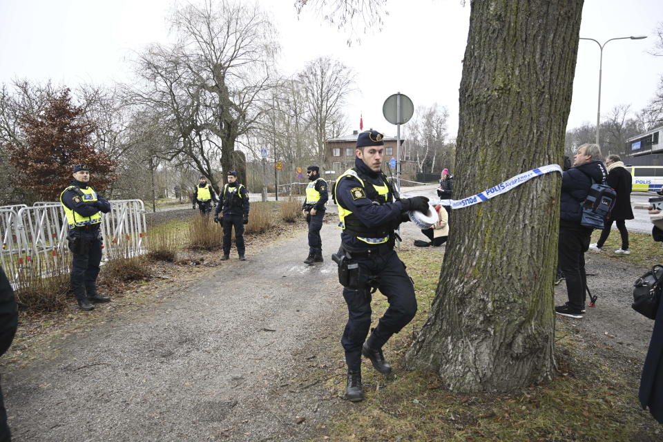 Police cordon off the area outside the Turkish embassy in Stockholm, Sweden, Saturday Jan. 21, 2023. Sweden is bracing for demonstrations that could complicate its efforts to persuade Turkey to approve its NATO accession. A far-right activist from Denmark has received permission from police to stage a protest on Saturday outside the Turkish Embassy, where he intends to burn the Quran, Islam’s holy book. (Fredrik Sandberg/TT News Agency via AP)