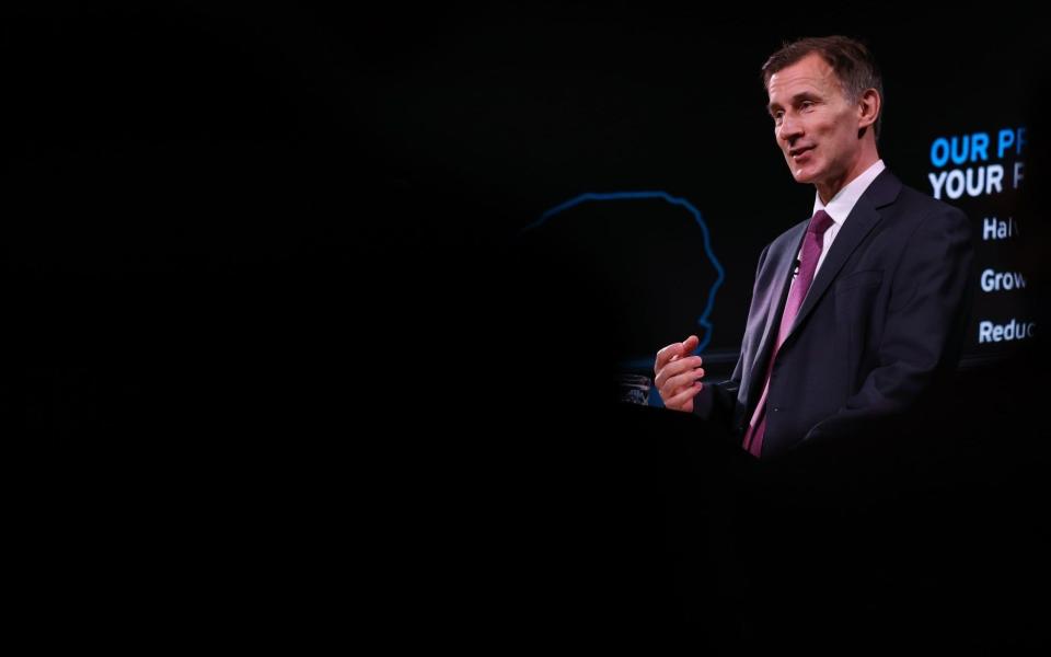 Jeremy Hunt, the Chancellor, is pictured delivering a speech at Bloomberg's HQ in central London this morning - Chris Ratcliffe/Bloomberg