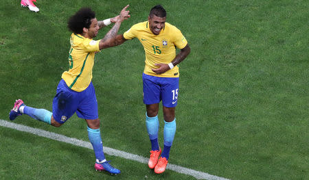 Football Soccer - Brazil v Paraguay - World Cup 2018 Qualifiers - Arena Corinthians stadium, Sao Paulo, Brazil - 28/3/17 - Brazil's Marcelo (L) celebrates his goal with his teammate Paulinho. REUTERS/Paulo Whitaker