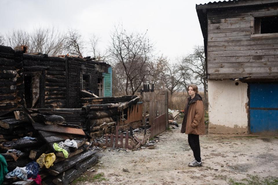 When the fighting began, Dmytro*, his pregnant mother Olha* and the rest of the family locked themselves in their property for one month and lived without electricity or water (Anastasia Vlasova/Save the Children)