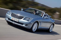 <p>During the production run of the first SLK, Mercedes and Chrysler were merged into the ill-fated entity DaimlerChrysler. They were later unmerged, but not before the SLK was transferred from one division to another. The end of its career as a Mercedes was immediately followed by a new one as the Chrysler Crossfire. </p><p>Chrysler produced a completely new body, unrecognisable from the original and with design cues from the iconic Art-Deco Chrysler Building in New York City. Available as a coupe as well as a roadster, almost all the engineering was carried over from the SLK, and the Crossfire was built in Germany - by Karmann - despite its American badge. Sales started well but soon faded badly, and the Crossfire was dropped in 2007 – the same year its parents divorced.</p>