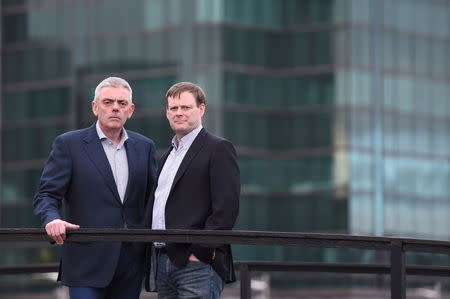 Dave O'Donoghue (L) and Cormac Manning, two former senior executives with speciality baker Aryzta, pose for a photograph in Dublin, Ireland February 11, 2016. REUTERS/Clodagh Kilcoyne