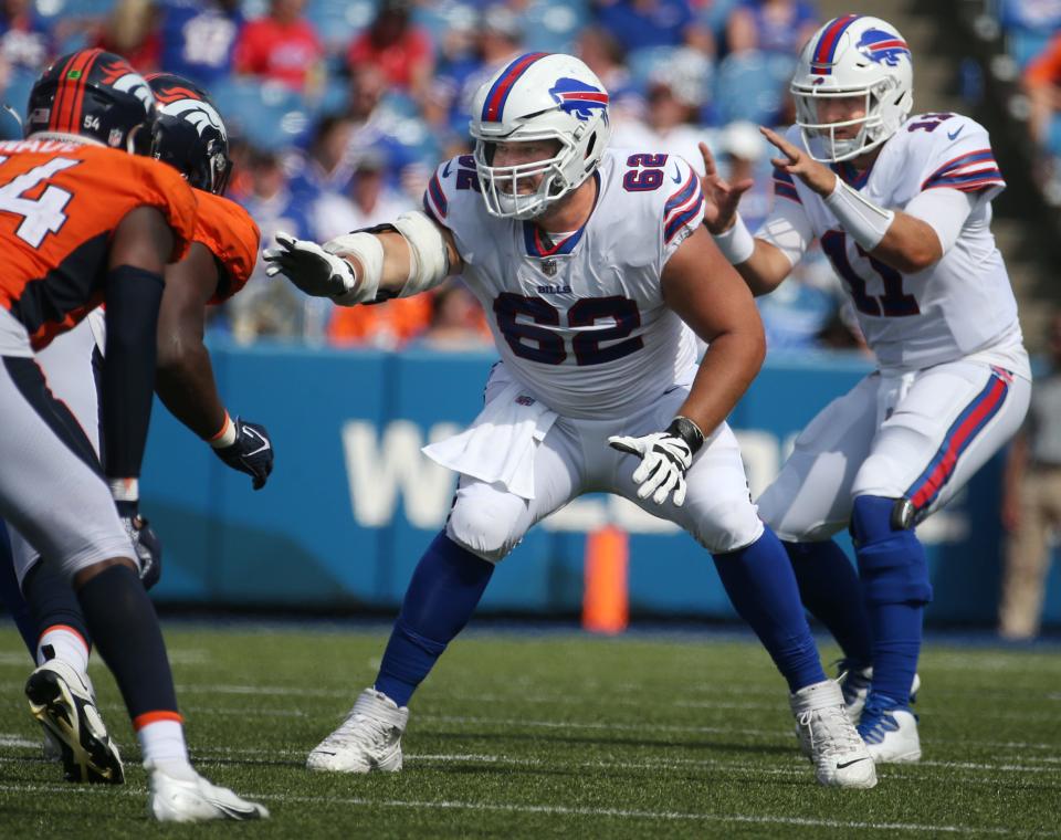 Bills lineman Greg Mancz (62) looks to pick up the block at the line as his quarterback Matt Barkley gets the ball from center in the second half of the Bills preseason game against Denver Saturday, Aug. 20, 2022 at Highmark Stadium.