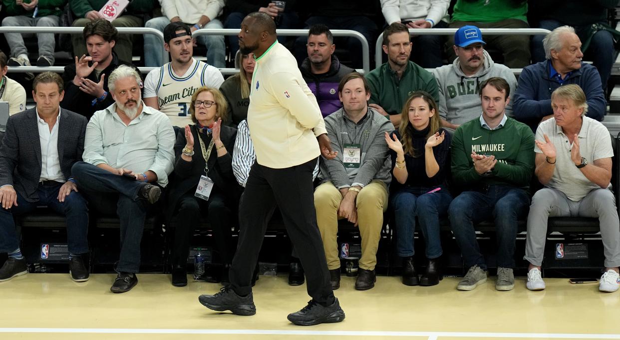 Milwaukee Bucks head coach Adrian Griffin is shown during the first half of their game against the New York Knicks Tuesday, December 5, 2023 at Fiserv Forum in Milwaukee, Wisconsin. Milwaukee Bucks owner Wes Edens is seated at far right.