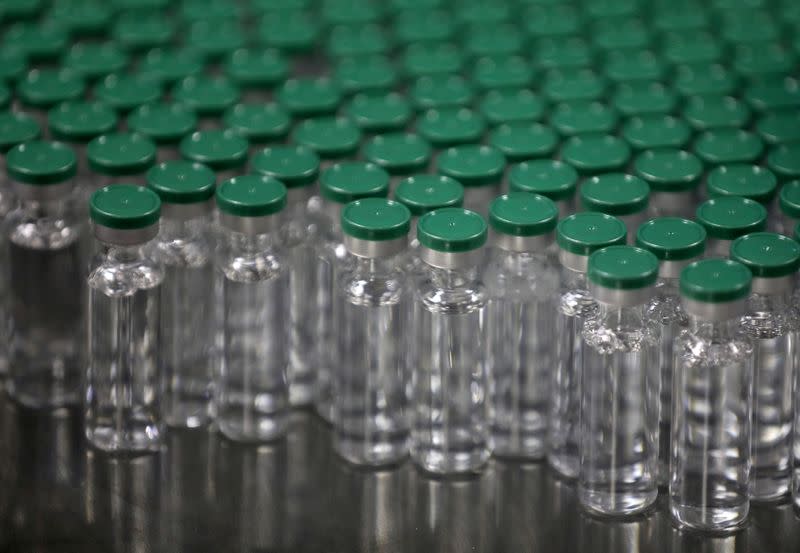 FILE PHOTO: Vials of AstraZeneca's COVISHIELD, coronavirus disease (COVID-19) vaccine, are seen before they are packaged inside a lab at Serum Institute of India, Pune
