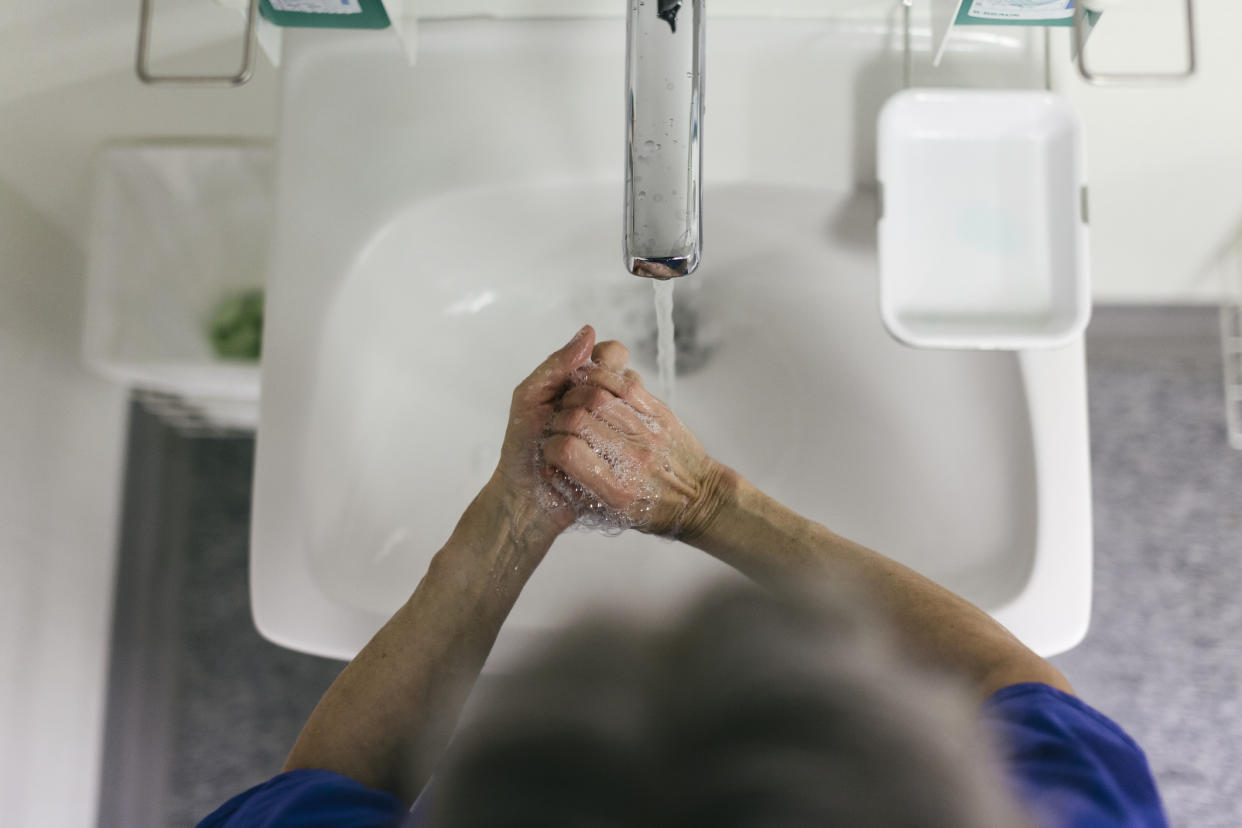 Person washing their hands