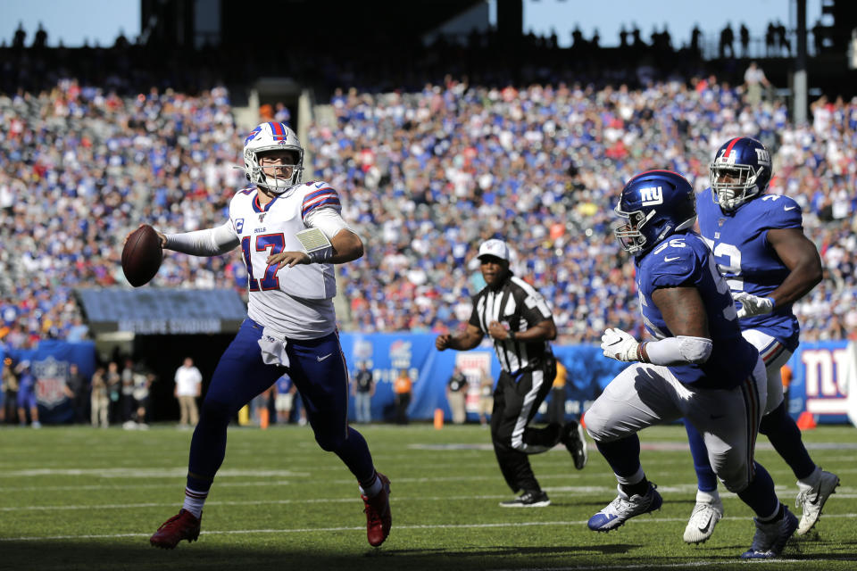 Buffalo Bills quarterback Josh Allen, left, looks to throw during the second half of an NFL football game against the New York Giants, Sunday, Sept. 15, 2019, in East Rutherford, N.J. The Bills defeated the Giants 28-14. (AP Photo/Adam Hunger)