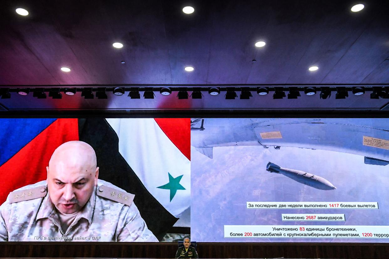 Sergei Surovikin pictured on screen during an army briefing during Russia-backed conflict in Syria in 2017. 