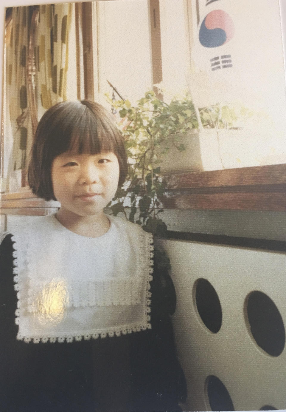 This undated photo provided by Joo-Rei Mathieson shows herself when she was in childhood taken in South Korea. A Brothers Home intake document describes Mathieson as a lost street kid brought in by police. It notes, chillingly for a government-sponsored vagrants’ facility that survivors have told The Associated Press often worked children to death, that she's “capable of labor.” She spoke no words for days, the document says, after entering Brothers, a now-destroyed facility in the southern port city of Busan where thousands of children and adults, most of whom were grabbed off the streets, were enslaved and often killed, raped and beaten in the 1970s and 1980s. (Courtesy of Joo-Rei Mathieson via AP)