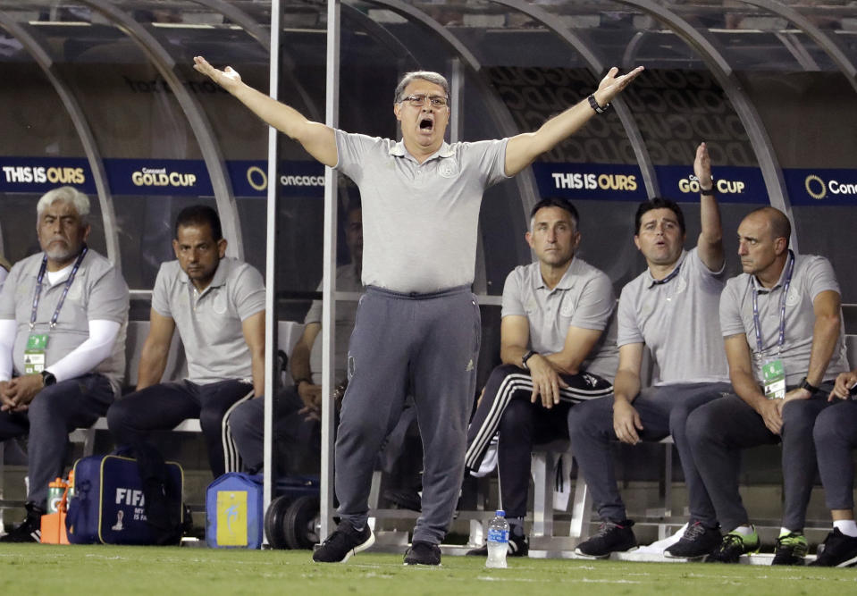 Mexico head coach Gerardo Martino reacts during the first half of a CONCACAF Golf Cup soccer match against Martinique in Charlotte, N.C., Sunday, June 23, 2019. (AP Photo/Chuck Burton)