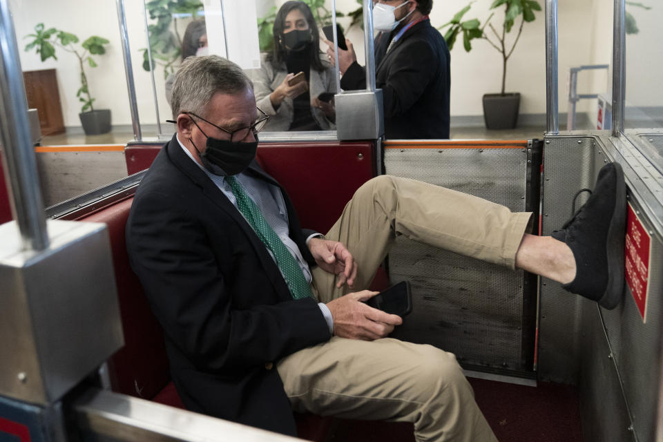 Sen. Richard Burr, R-N.C., departs on Capitol Hill in Washington, Saturday, Feb. 13, 2021, after the Senate acquitted former President Donald Trump in his second impeachment trial in the Senate. Trump was accused of inciting the Jan. 6 attack on the U.S. Capitol, and the acquittal gives him a historic second victory in the court of impeachment. (AP Photo/Alex Brandon)