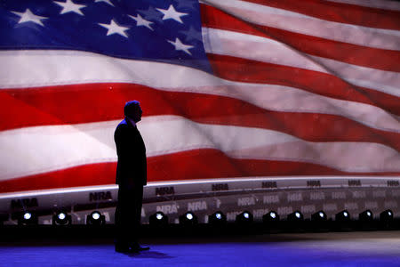 FILE PHOTO: NRA Executive Vice President and CEO Wayne LaPierre waits for U.S. President Donald Trump to take the stage at the National Rifle Association (NRA) Leadership Forum at the Georgia World Congress Center in Atlanta, Georgia, U.S. on April 28, 2017. REUTERS/Jonathan Ernst/File Photo