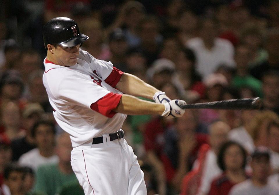 Rocco Baldelli drives in a run for the Red Sox during an August 2009 game against the Yankees at Fenway Park.