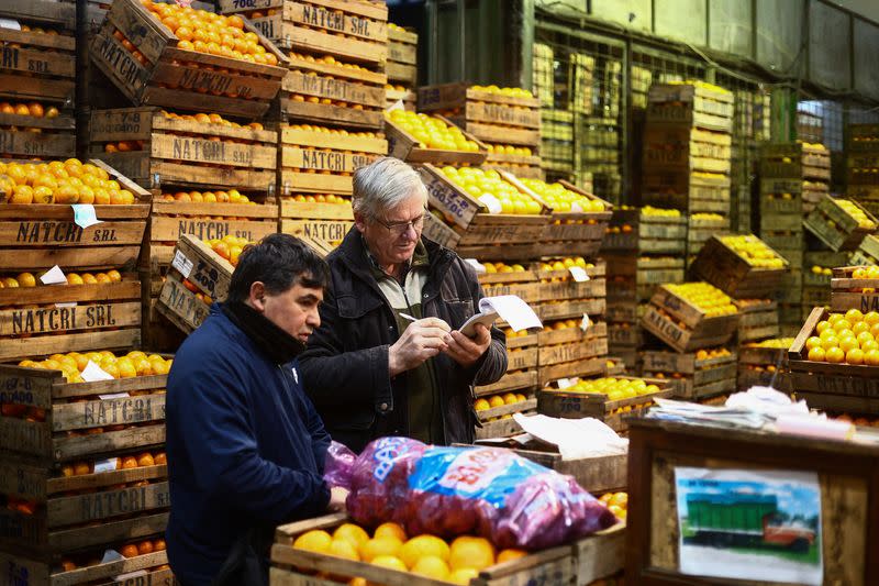 Argentines face daily race for deals as inflation soars above 100% in Buenos Aires, Argentina