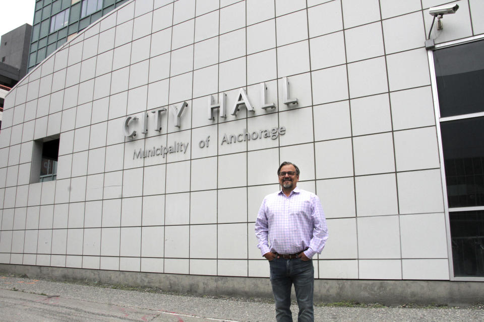 Christopher Constant, the chair of the Anchorage Assembly, poses for a photo in downtown Anchorage, Alaska, on Wednesday, July 26, 2023. Constant said Mayor Dave Bronson's plan to give homeless people a plane ticket out of Anchorage instead of using's the city's sports arena as a shelter this winter is problematic because so many are Alaska Natives and there is nowhere to send them, as Anchorage is their land. (AP Photo/Mark Thiessen)