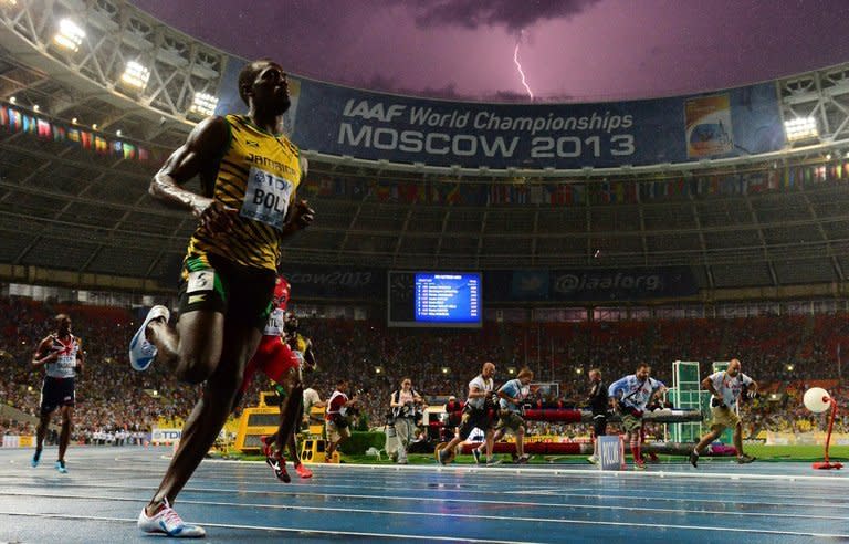 Jamaica's Usain Bolt wins the 100 metres final at the 2013 IAAF World Championships at the Luzhniki stadium in Moscow on August 11, 2013. Bolt on Friday safely negotiated his way into the semi-finals of the 200m at the World Athletics Championships