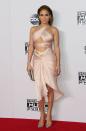 <p>This American Music Awards dress is, hands down, one of our all-time favourite J.Lo outfits, with the wrap-around straps hugging every curve so perfectly, it looks like it was made for her (which it likely was).</p>