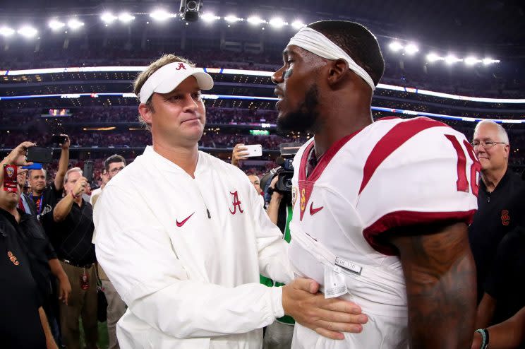 Alabama's Lane Kiffin consoles USC's Quinton Powell after the game Saturday. (Getty)