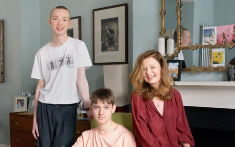 Genevieve with sons Reuben, 19, and Sebastian, 16, at home in December 2017 - Credit:  Leo Goddard