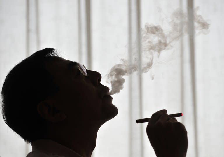 The inventor of the electronic cigarette, Hon Lik, smoking his invention in Beiijng in 2009. NJOY is one of a flurry of e-cigs entering the market as tobacco prices skyrocket and smokers become ever more concerned about the toxins they inhale